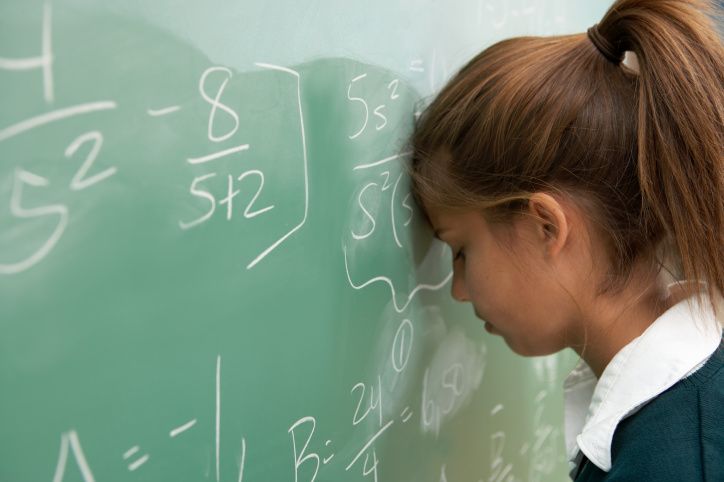 Student revising GCSE Maths topics and solving equations to prepare for upcoming exams